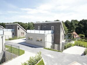 Wellnessvilla mit privatem Innenpool in einem Ferienpark in den Maasduinen - Arcen - image1