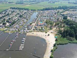 Holiday park Chalet on the water at the beautiful Veluwemeer - Hulshorst - image1