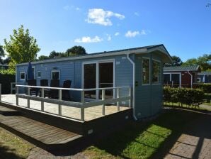 Parque de vacaciones Cómodo chalet con microondas combinado, en una zona verde - arcén - image1