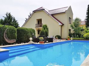 Vakantiepark Luxe vakantiehuis met privézwembad in Trzesacz - Rewal - image1