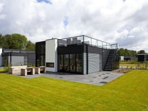 Vakantiepark Luxe huis met een gashaard, aan een natuurgebied - Baarlo - image1