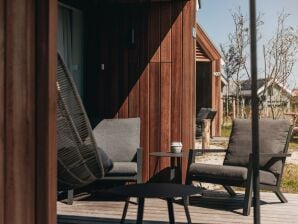 Parc de vacances Tiny house moderne avec lave-vaisselle, plage à 500m - Nieuwvliet - image1