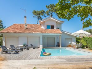 Parc de vacances Villa avec une piscine privée à 400m de la plage - Peste de Moliets - image1