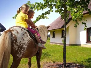 Holiday park Ferienhaus im Van der Valk Resort in Linstow - Dobbin-Linstow - image1