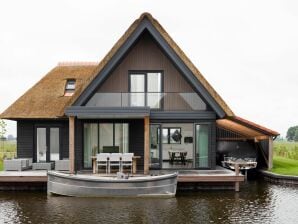 Vakantiepark Moderne watervilla met drie badkamers, bij de Friese Meren - Ossenzijl - image1