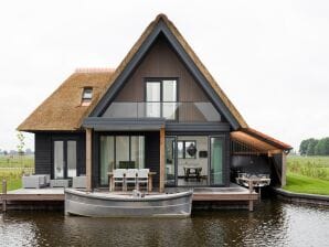 Holiday park Modern watervilla with three bathrooms, at the Frisian Lakes - Ossenzijl - image1