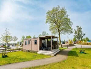 Vakantiepark Knus chalet met afwasmachine, vlakbij een meer - Maurik - image1