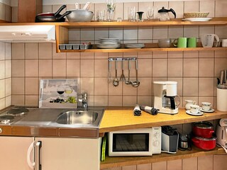 small kitchen with many extras