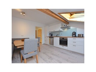 Kitchen with table and chairs,...