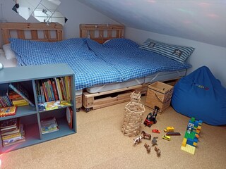 Kids room with book, games, etc