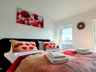 Schlafzimmer mit Doppelbett