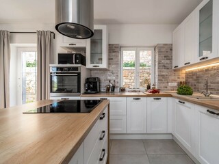 There is a fully equipped and very modern kitchen