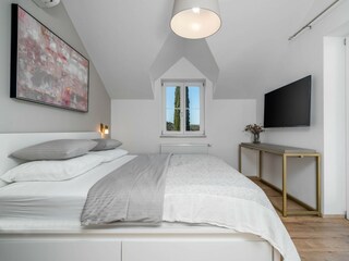 Bedroom has a view of the Dol valley and the sea.