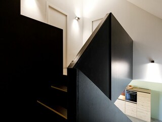 Treppenaufgang in das Obergeschoss mit den Schafzimmern