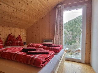 Bedroom 1 - cosy bedroom with a view over the valley