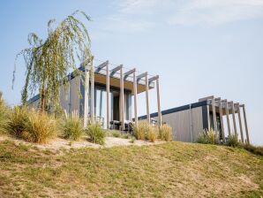 Ferienpark Chalet am Strand und Hafen mit Terrasse