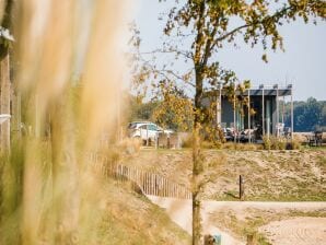 Parco vacanze Chalet am Strand und Hafen mit Terrasse