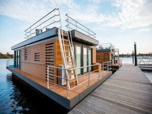 Hausboot mit Blick auf das Leukermeer, am Rande eines Ferienparks - Geijsteren - image1