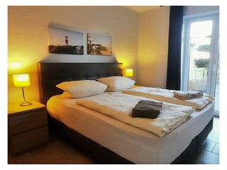 Schlafzimmer mit Doppelbett