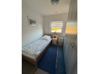 Schlafzimmer mit einem Einzelbett