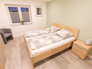 Hauptschlafzimmer mit Doppelbett
