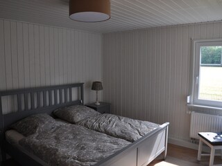 Schlafzimmer mit Doppelbett