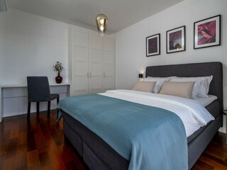 Bedroom No2, with air-conditioning, and a TV.