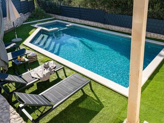 Fully air-conditioned 4-bedroom villa with heated priva