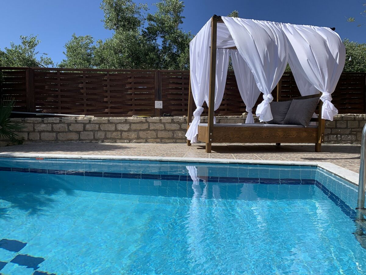 Cozy sun bed at the pool