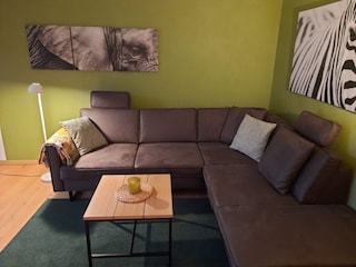 Wohnzimmer mit Balkon