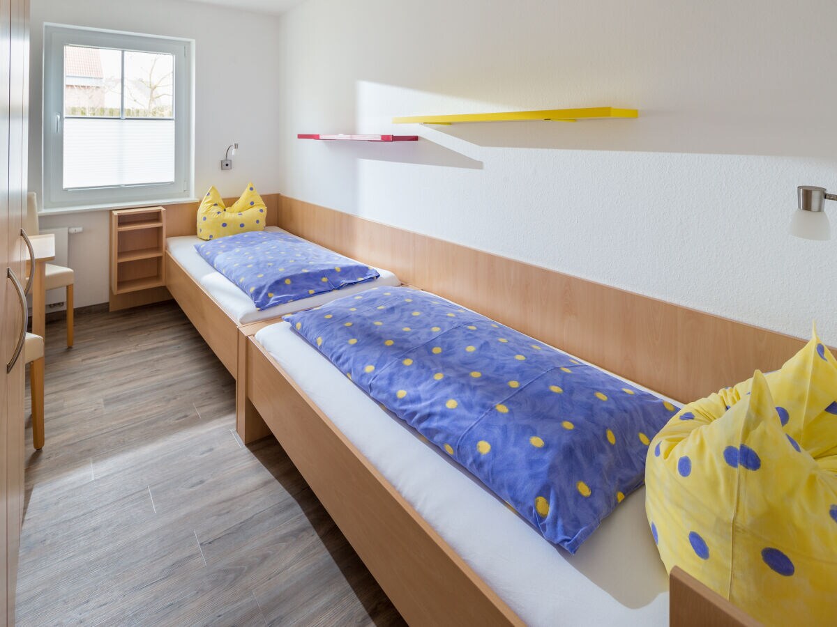 zusätzliches Schlafzimmer mit zwei Einelbetten