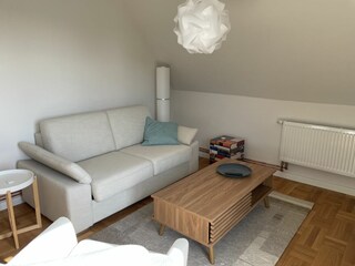 Wohnzimmer mit Schlafcouch