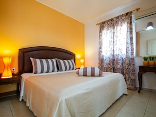 Schlafzimmer eines der Ferienwohnungen Preise anfragen