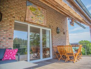 Maison de vacances Relais Le Roi avec une terrasse à Warisy
 jardin avec salon extérieur - Rendeux - image1