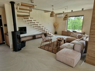 Living area with fireplace and TV