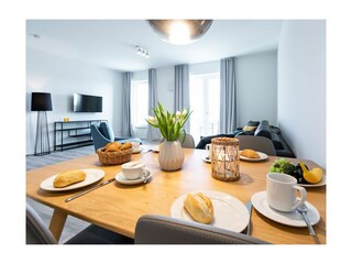 Hafenspitze App.1.03- heller Wohn- und Essbereich