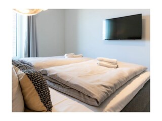 Hafenspitze App.1.03- Schlafbereich mit zweitem TV- Gerät