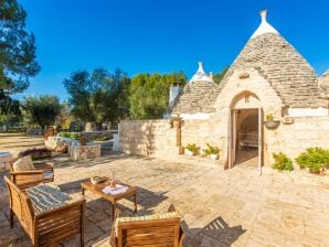 Vakantiehuis Trullo met zwembad voor baby's - San Michele Salentino - image1