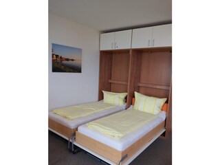 Aufgeklappte Schrankbetten in der Ferienwohnung Inselblume 03 auf Fehmarn