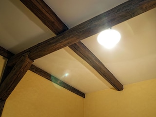 Beam ceiling in the bedroom