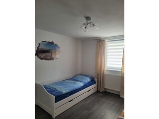 Partial view of the children's bedroom (2 beds)