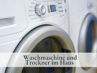 Waschmaschine und Trockner im Treppenhaus