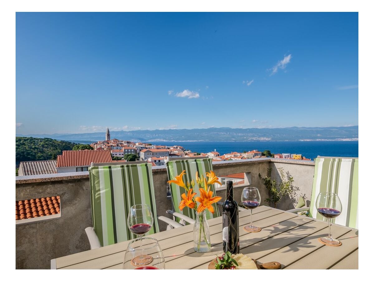 Balcony with a view of the sea and the old town