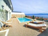 Villa Kucha 26 b with a pool and a sea view