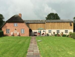 Maison de vacances à Westerhever avec une cheminée et un beau jardin - Westerever - image1