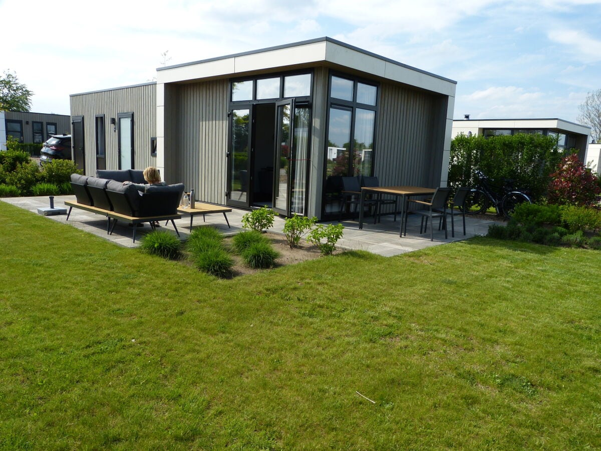 View of the chalet with two terraces from the garden