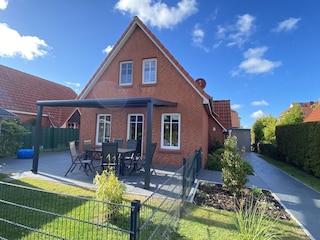 Ferienhaus mit umzäunten Garten