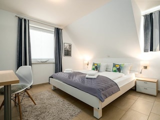 1. Schlafzimmer im Obergeschoss