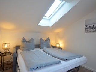 Schlafmöglichkeit im Wohnzimmer