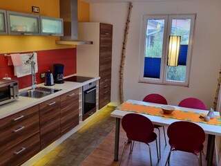 Cook something delicious in the kitchen.